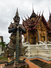 Dvarapala (gate guardian) statue at Wat Khok Samankhun (Buddhist temple) in Hat Yai, Thailand