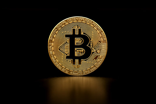 crypto currency bitcoin golden representation on black background