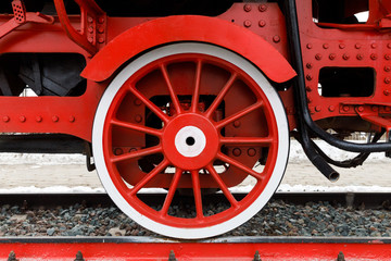 red wheel and detail of mechanism a vintage russian steam train locomotive