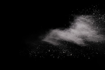White powder. Grainy abstract texture on black background.