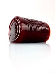 Canned, jellied cranberry sauce isolated on a white background