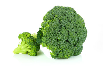 Fresh broccoli vegetable isolated on white background in close-up.