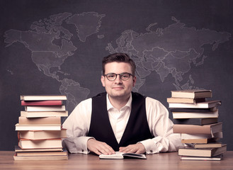 Geography teacher at desk