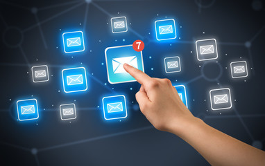 Hand touching mail icon