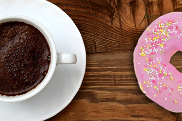 Extremely tasty sweet donut together with aromatic coffee full of caffeine is an unforgettable taste and relaxation experience after every effort, both mental and physical.
