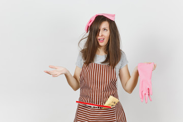 Young fun crazy dizzy loony wild screaming housewife tousled hair in striped apron squeegee...