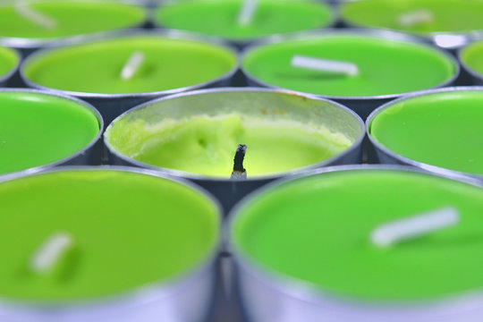 Green candle, A lot of good candles and one burned candle
