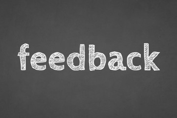 Fototapeta premium Feedback on blackboard - Teamwork concept