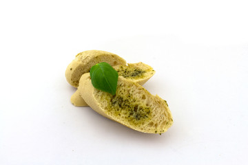 A normal herb butter baguette on a white background