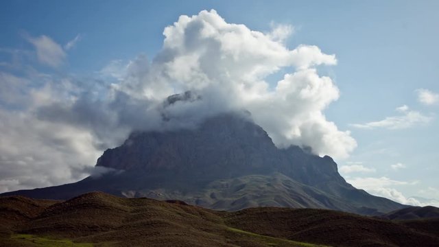Clouds Moves Over The Mountain Peak. Azerbaijan Nature Landmark