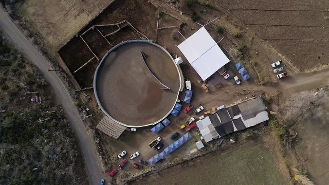 Aerial view of horse riding activity at mountain valley