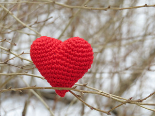 Knitted red heart. Donation and care concept. Love heart, Valentines day symbol