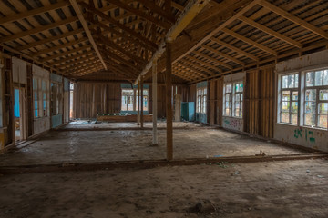 Interior of an abandoned building with broken windows