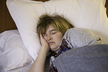 Woman sleeping in bed