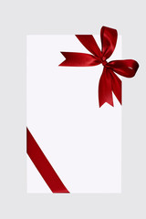 White gift box tied red ribbon