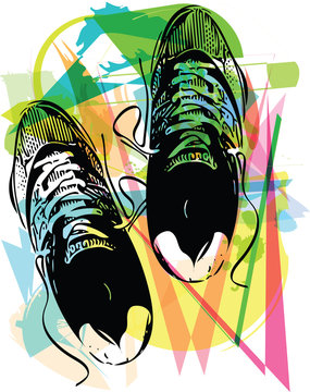Pair of running shoes laid on abstract background