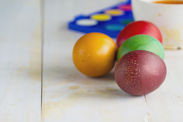 Colored Easter eggs on a white background. Easter background.