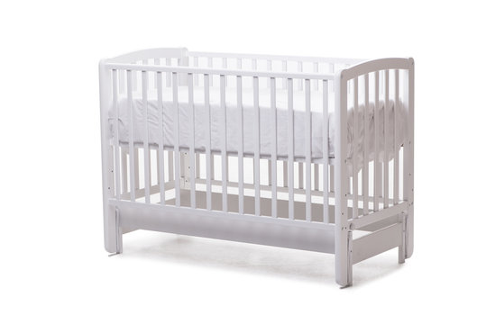 Baby bed cot isolated on the white background