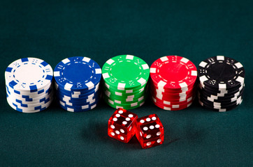 Chips and cards on casino table 
