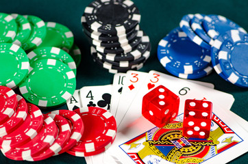 Chips and cards on casino table 