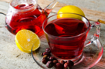 Fruit berry tea in the cup served on table