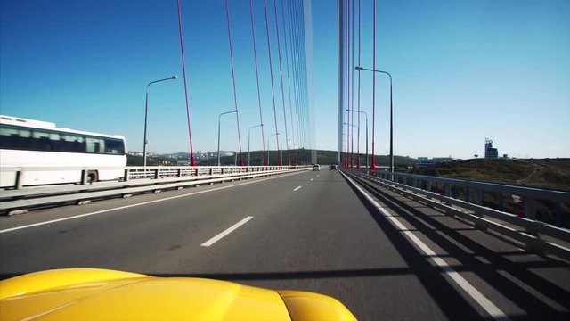 Middle aged man is driving his luxurious cabriolet  moving along the morning road in Vladivostok, Russia