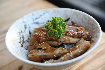 japanese food , Chicken teriyoki with rice on wood background