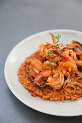 seafood risotto with mussel shrimp and squid , italian food