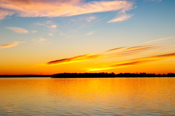 Fototapeta na wymiar Sunset over a lake in Oklahoma.