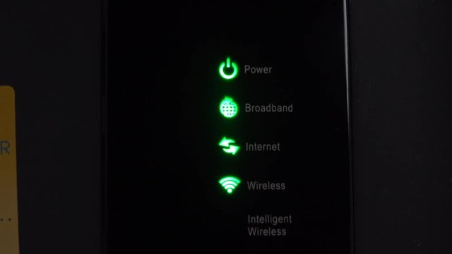 close up of modem or router, internet access concept with flashing lights