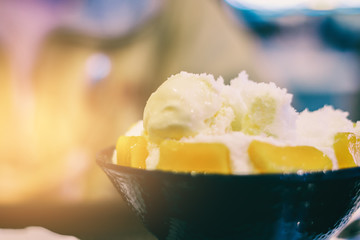 Close up Mango shaved ice dessert and ice cream , favourite famous dessert