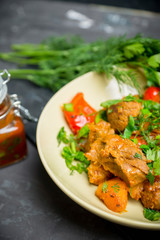 Roasted meat with potatoes, ojaxuri, traditional Georgian food. Selective focus.