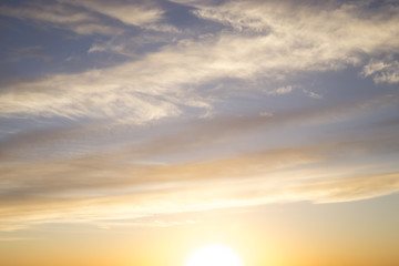 Beautiful Sunrise of Blue and Gold Shades in the Clouds