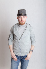 confident man in a cap