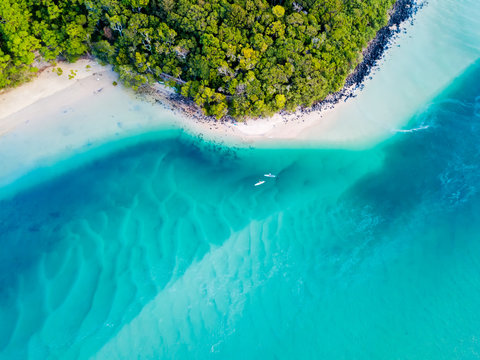 A vibrant aerial view of the beach