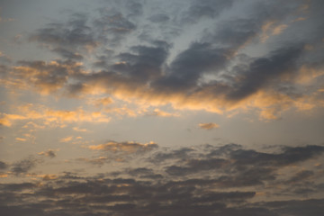 Fototapeta na wymiar Golden cloud and light golden sky.