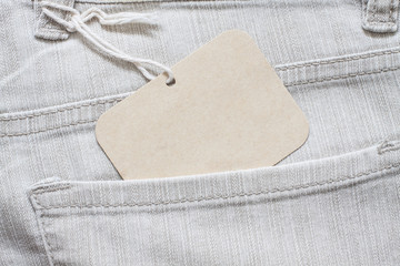 Price tag mock up, brand label in jeans pocket