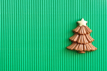 A chocolate christmas tree decorated with a white star