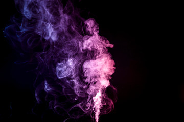 Cloud of smoke of purple colors on black  isolated background. Background from the smoke of vape