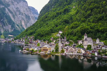Fototapeta na wymiar Nice View from Hallstatt , Austria . Took this photo by drone during summer afternoon in cloudy day . Fly the drone in the city centre , The view look different from what we always see 