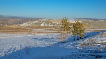 snow covered slopes of waste piles from open pit coal mining
Sagan Nur, Republic of Buryatia, Russia