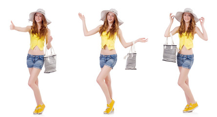 Fototapeta premium Young girl with panama and handbag in fashion concepts isolated