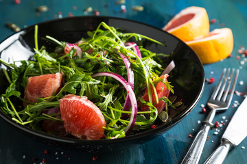 Citrus salad with arugula and grapefruit