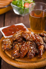 Grilled chicken wings with hot sauce