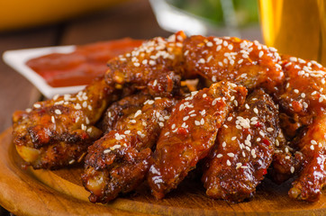 Grilled chicken wings with hot sauce