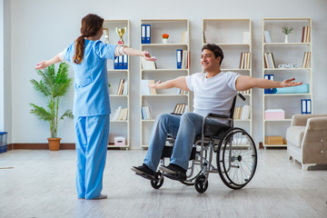 Fototapeta premium Patient undergoing rehabilitation recovery programme with doctor