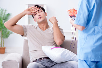 Obraz premium Patient getting blood transfusion in hospital clinic