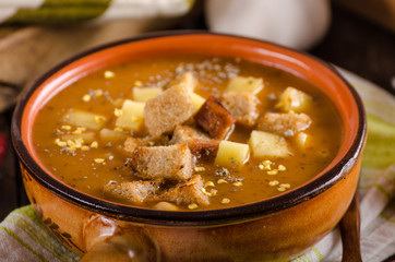 Goulash soup with croutons and potatoes