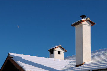 Roof of the House in the Winter