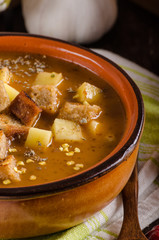 Goulash soup with croutons and potatoes